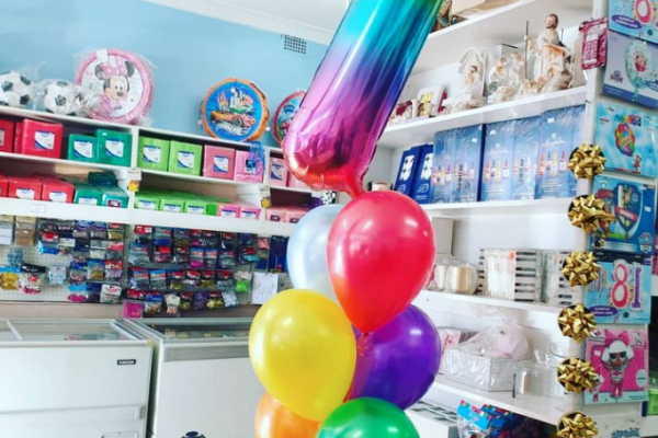 86cm #7 rainbow foil balloon with 3 rows of 2 balloons under (light blue & red, yellow & purple, orange & green).